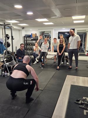 Attendees practising a standing exercise during DNS Exercise Part II at Elevate LDN